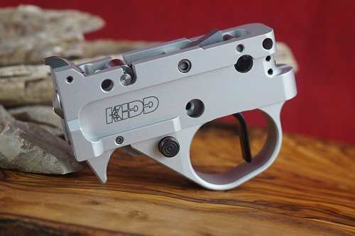 Kidd silver two stage trigger with black straight blade and silver extended (medium) magazine release lever 